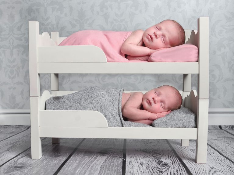 Newborn in bunk beds captured b y Treasured Moments Photography